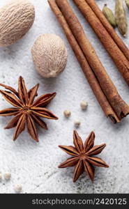 high angle star anise nutmeg with cinnamon sticks