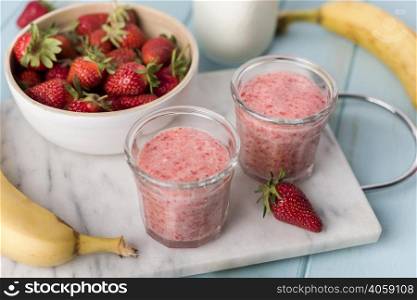 high angle strawberry smoothies
