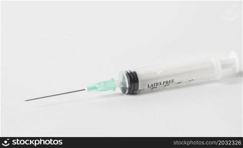 high angle syringe white background