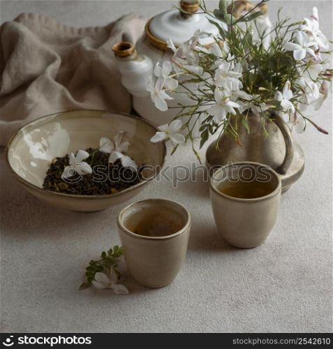 high angle tea cups beautiful flowers