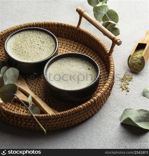 high angle tea cups herbs
