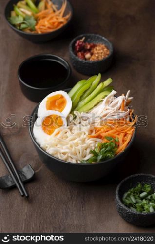 high angle traditional asian noodles with eggs vegetables