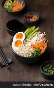 high angle traditional asian noodles with eggs vegetables