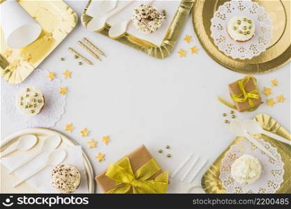 high angle view birthday gifts cupcake candles white background