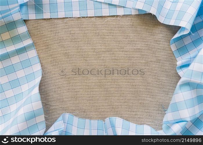 high angle view blue chequered table cloth forming frame