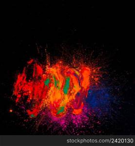 high angle view bright holi colored front black background