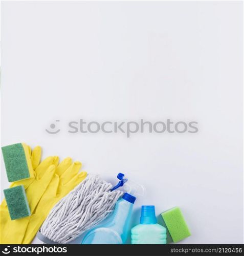 high angle view cleaning products grey background