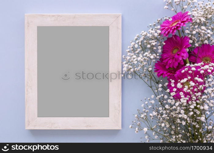 high angle view empty frame with pink flowers baby s breath