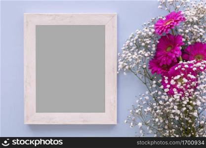high angle view empty frame with pink flowers baby s breath