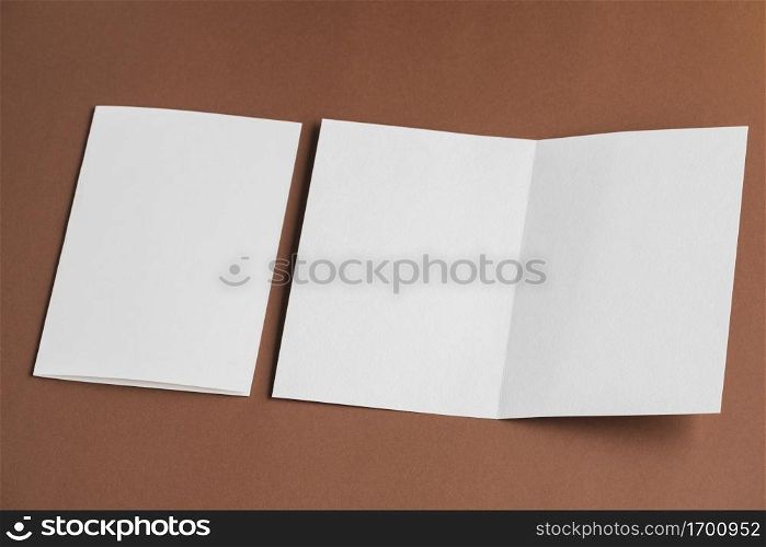 high angle view folded unfolded blank white papers