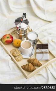 high angle view healthy breakfast messy bedsheet