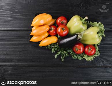 high angle view healthy raw vegetables black wooden surface