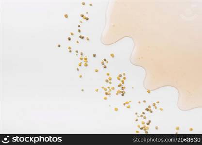 high angle view honey bee pollen seeds white background