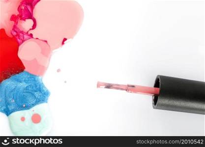 high angle view multi colored nail polish brush white background