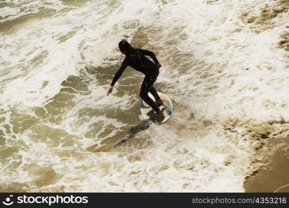 High angle view of a boogie boarder on the beach