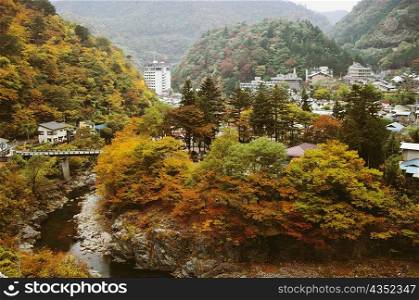 High angle view of a bridge across a stream, Kawaji Hot Spring, Tochigi Prefecture, Japan