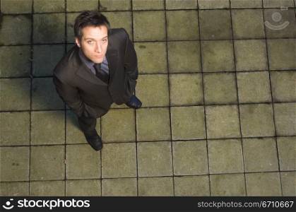 High angle view of a businessman looking up