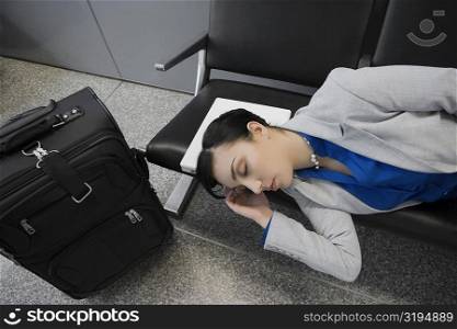 High angle view of a businesswoman sleeping