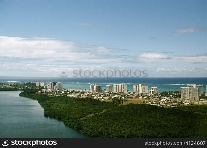 High angle view of a coastal city with lush vegetation, San Juan, Puerto Rico