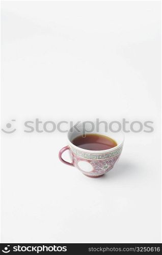 High angle view of a cup of black tea