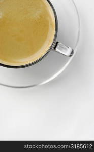 High angle view of a cup of coffee on a saucer