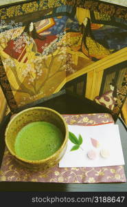 High angle view of a cup of maccha tea, Genji museum, Uji, Japan
