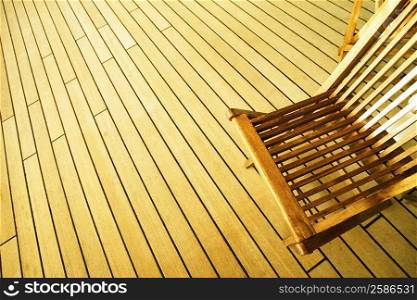 High angle view of a deck chair on a deck