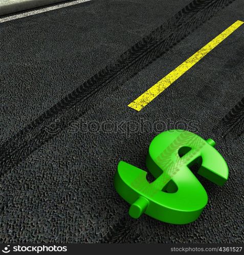 High angle view of a dollar sign on the road