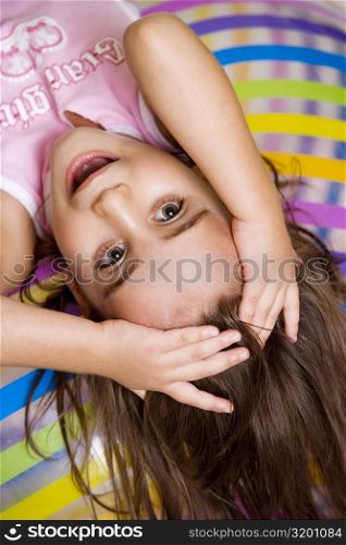 High angle view of a girl lying down