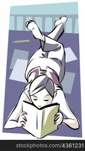 High angle view of a girl reading a book