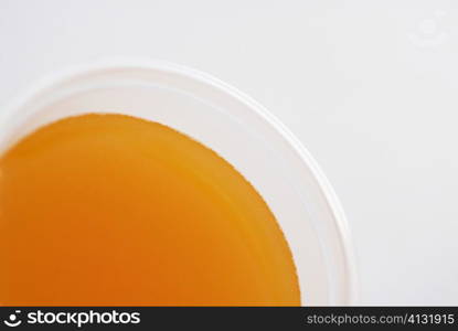 High angle view of a glass of orange juice