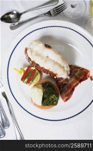 High angle view of a lobster dish on a plate