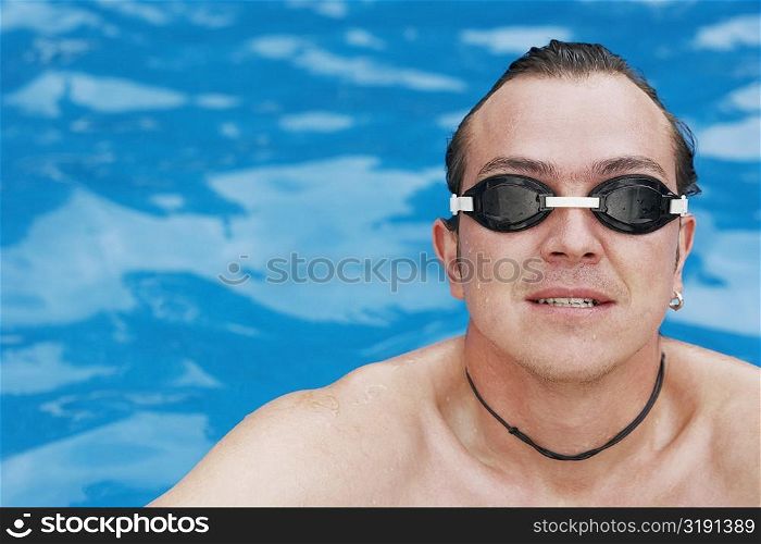 High angle view of a mid adult man in a swimming pool