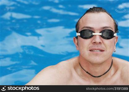 High angle view of a mid adult man in a swimming pool