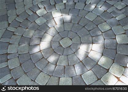 High angle view of a mosaic stone path