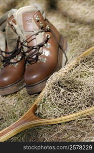 High angle view of a pair of shoes and a fishing net