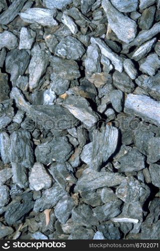 High angle view of a pile of grey rocks