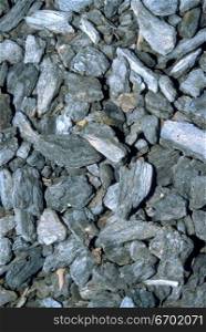 High angle view of a pile of grey rocks