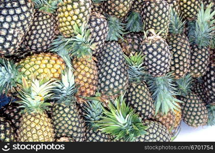 High angle view of a pile of pineapples