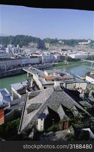 High angle view of a river flowing through a city, Salzach River, Salzburg, Austria
