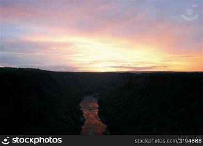 High angle view of a river passing through mountains at sunset, Zambezi River, Zimbabwe