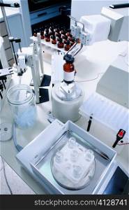 High angle view of a robot arm used to prepare artificial flavor samples
