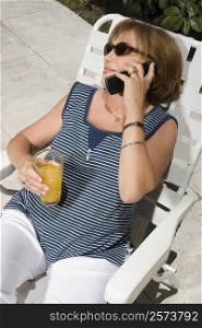 High angle view of a senior woman talking on a mobile phone