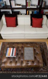 High angle view of a serving tray and towels on a table in a living room