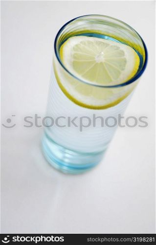High angle view of a slice of lemon in a glass