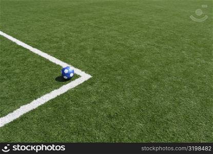 High angle view of a soccer ball in a soccer field