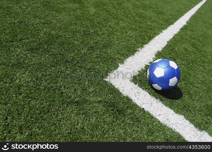 High angle view of a soccer ball near a yard line