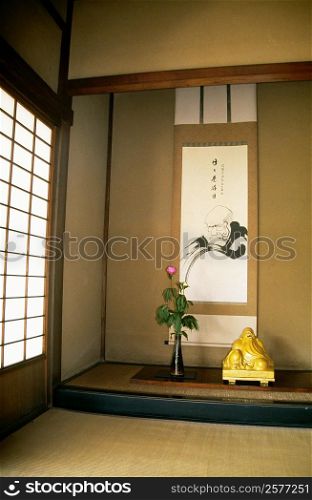 High angle view of a statue and a vase in a room, Ryogen-In Zen Temple, Kyoto, Japan