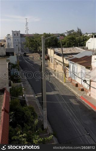 High angle view of a street light and power lines in a city