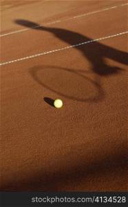 High angle view of a tennis ball on a tennis court